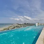 Artsy Oceanview Condo W Incredible Rooftop Pool